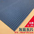 Gray-blue brick-patterned rubber mat on roof simulating PVC panels