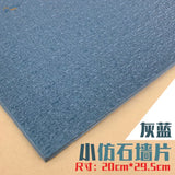Gray-blue faux stone roof simulating PVC panel with brick texture