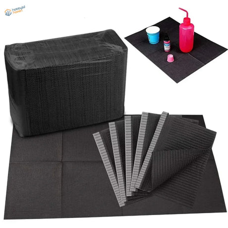 Black textured disposable clean pads with gray adhesive strip for precision hobby tools