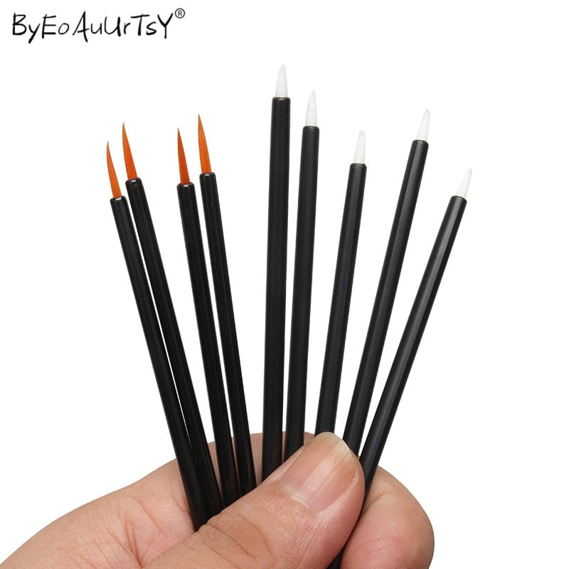 50 pcs disposable round quality brushes with black handles and fine orange tips by Byeoauurtsy