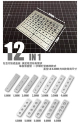Silver round shape airbrush template set with various screw holes for painting