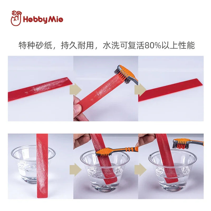 Hobby Mio sanding stick being rinsed with water and a toothbrush to clean it