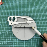 White 3D-printed multi-angle cutting aid, precision hobby tool with angular design