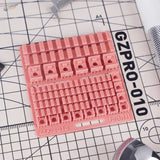 Pink Gzpro-010 cutting mat with grid for 3D-printed scale modeling tools