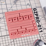 Pink gzpro-011 cutting mat with 3D-printed details for scale modeling tools