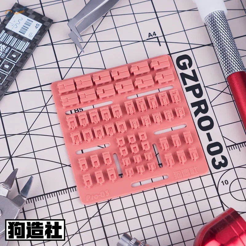 Pink gzpro-03 keycap puller, 3D-printed scale modeling tool