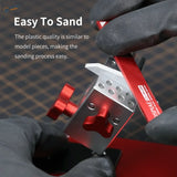 Red and silver graduated plastic board sanding tool with textured grip