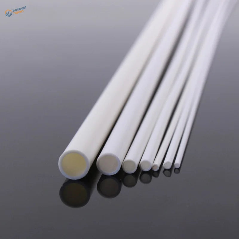 40pcs 2-10mm ABS round tubes for scale modeling on reflective surface