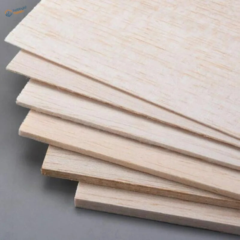 Stack of smooth balsa wood sheets with natural grain, 1mm-8mm