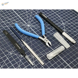 Blue-handled precision wire cutters in 5-in-1 premium craft tools with black pen