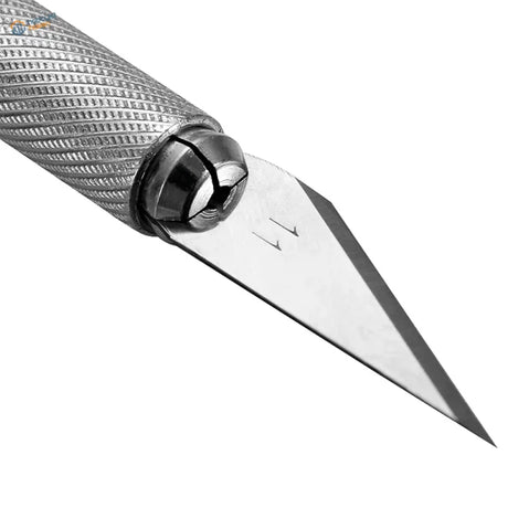 Pointed #11 hobby knife blade, close-up