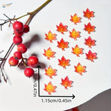 Vibrant red maple leaves resin charms, 50/100pcs on white surface