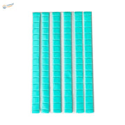 Six turquoise reusable tack strips with grid pattern for scale modeling
