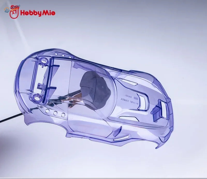 Transparent purple toy car shell with black cap in 50g pre-cut reusable tack for scale modeling tools