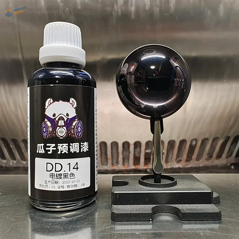 Electroplated mirror-chrome paint sample sphere on a black modeling stand