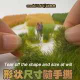 Miniature diorama with 12mm static grass tufts on grassy fields