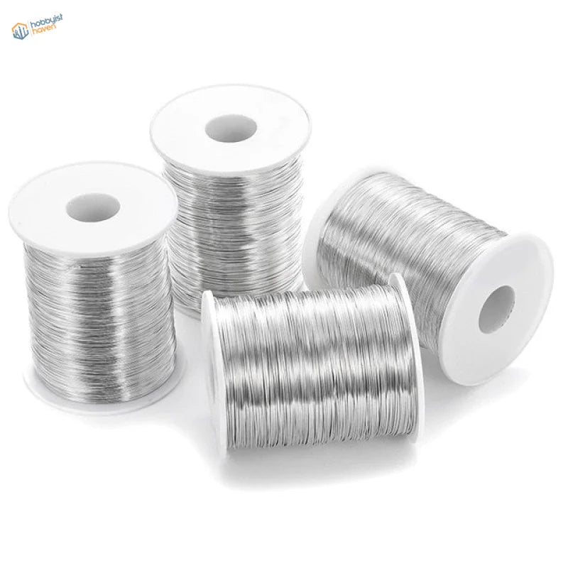 Four spools of 5m 0.3-0.8mm brass steel wire on white cores