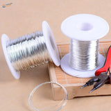 Two spools of silver brass steel wire on white cores, 0.3-0.8mm 5m