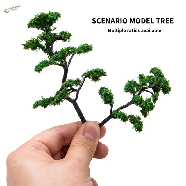 Black plastic miniature tree with green moss foliage for scale modeling tools