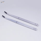 Silver curved-tip tweezers on 600#/1000# precision angled file