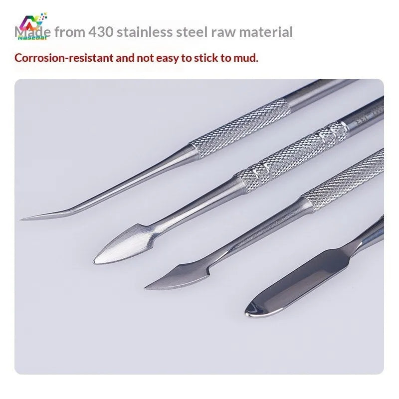 Close-up of four stainless steel carving blade heads in different shapes