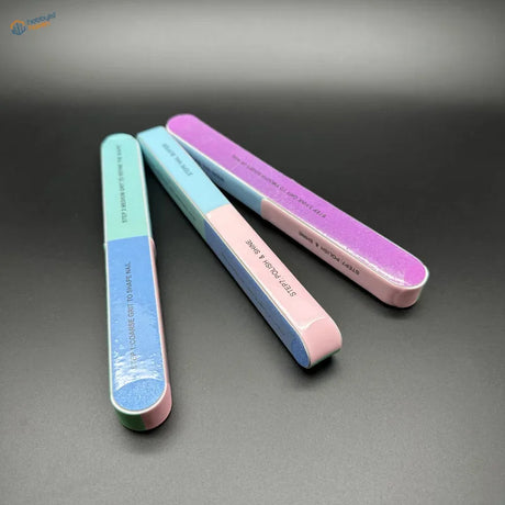 Seven-sided polishing rod with pastel multi-step abrasive surfaces designed to remove mold lines and polish models