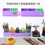 Purple glue holder boxes with green indents for scale modeling tools