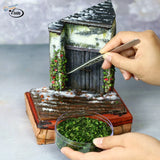 Rustic shed diorama with colorful leaves for scale modeling