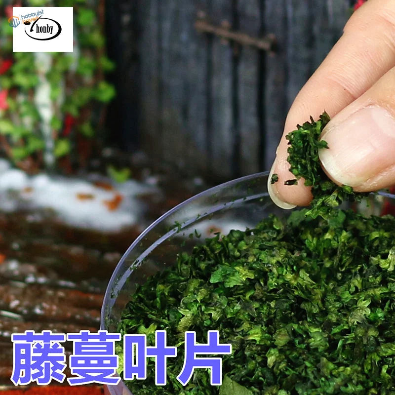 Hand holding 7g colorful leaves for dioramas in scale modeling bowl