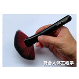 Black-handled soft fan model cleaning brush with red and black bristles
