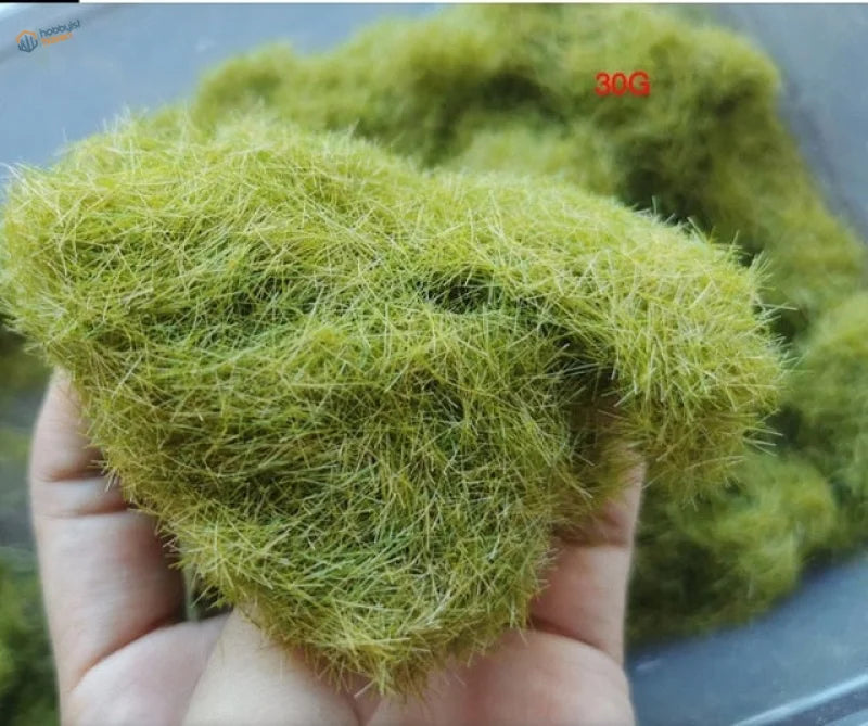 8mm green static grass clump with vibrant yellowish-green fibers