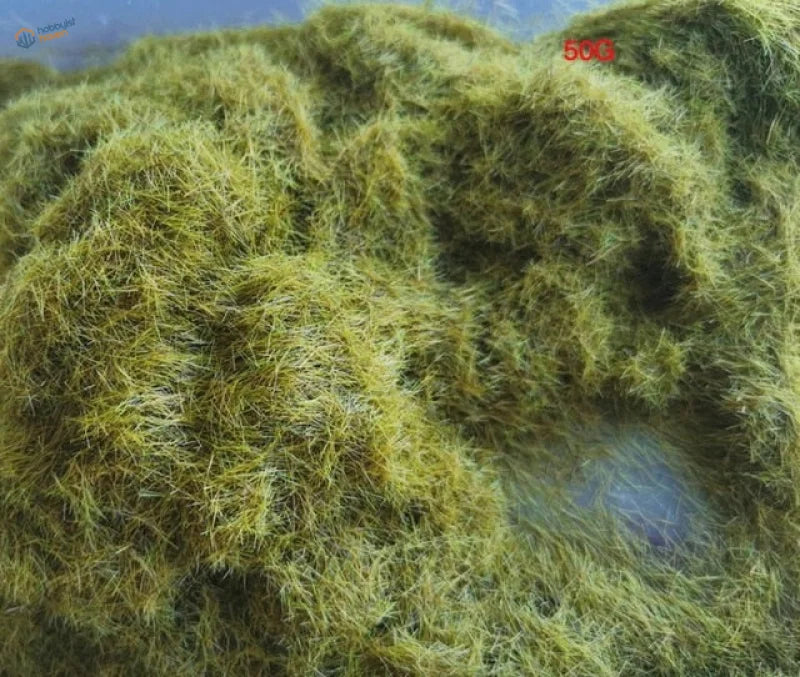 8mm green static grass: dense tangled greenish-yellow aquatic mass