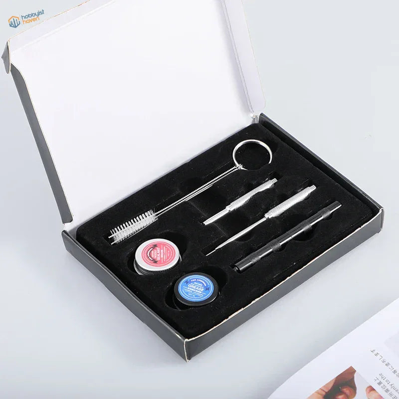 8pcs airbrush cleaning set in black box with silver tools and pink blue jars