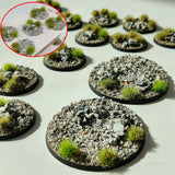 Circular black plastic base toppers featuring gray and white gravel with green grass for scale modeling tools