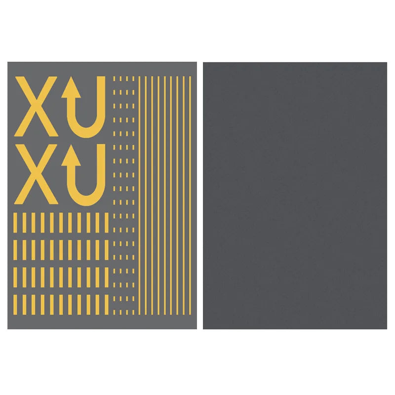 Road marking sticker sheet with yellow lines next to a plain asphalt sheet