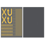 Road marking sticker sheet with yellow lines next to a plain asphalt sheet