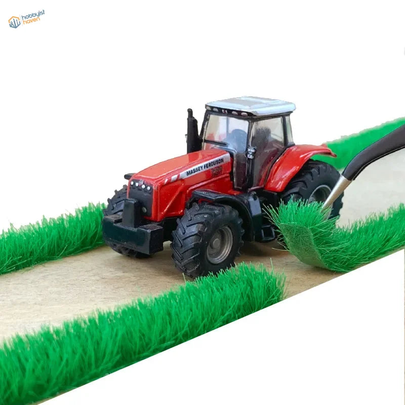 Red and black Massey Ferguson tractor on 9mm static grass strips