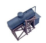Dark blue plastic ho scale 1 87 tanker truck model on brown metal frame stand storage tank kit display