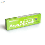 Green rectangular tube of ab epoxy putty labeled in chinese and english for scale modeling tools and scale models