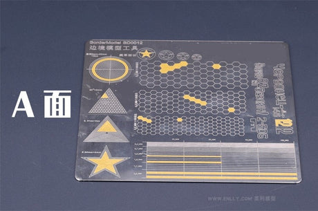Black and yellow double-sided masking tape cutting template with geometric patterns