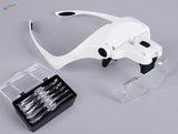 White adjustable LED light headband magnifier with 5 lenses and clear view