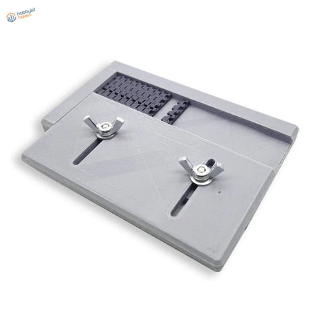 Gray plastic keycap puller for adjustable track building jig