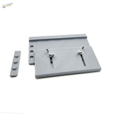 Gray 3D-printed adjustable track building jig plate with silver wing nuts
