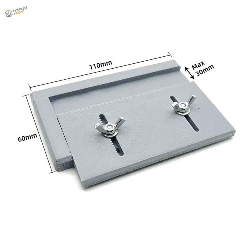 Gray 3D-printed adjustable track building jig with silver wing nuts and markings