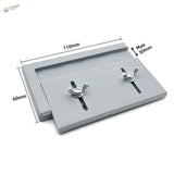 Gray 3D-printed adjustable track building jig with silver wing nuts and markings