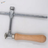 Adjustable wire saw with silver metal jeweler’s saw frame, light wood handle, and medium-tooth blades rated kit includes 12 blades