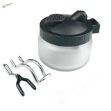 Black translucent airbrush cleaning pot with perforated lid and nozzle