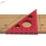 Red aluminum square ruler with imperial metric scales and holes