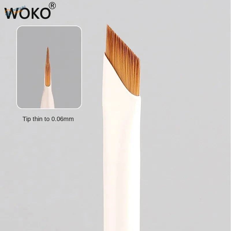 Woko angled liner brush with white handle and golden-brown bristles