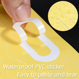 Peeling a self-adhesive PVC road marking sticker